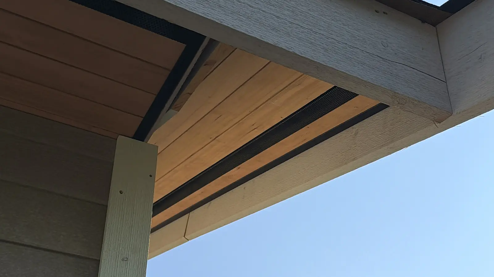 Cedar soffit and Hardie siding by Moonrise Construction, Fraser Valley