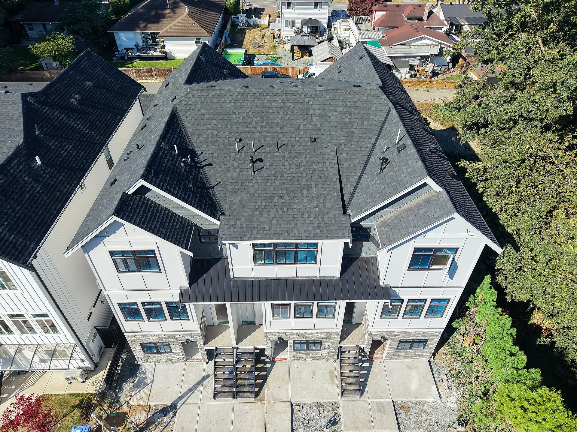 Street-side townhouse block from above, board and batten, panel and shake gables, Abbotsford BC