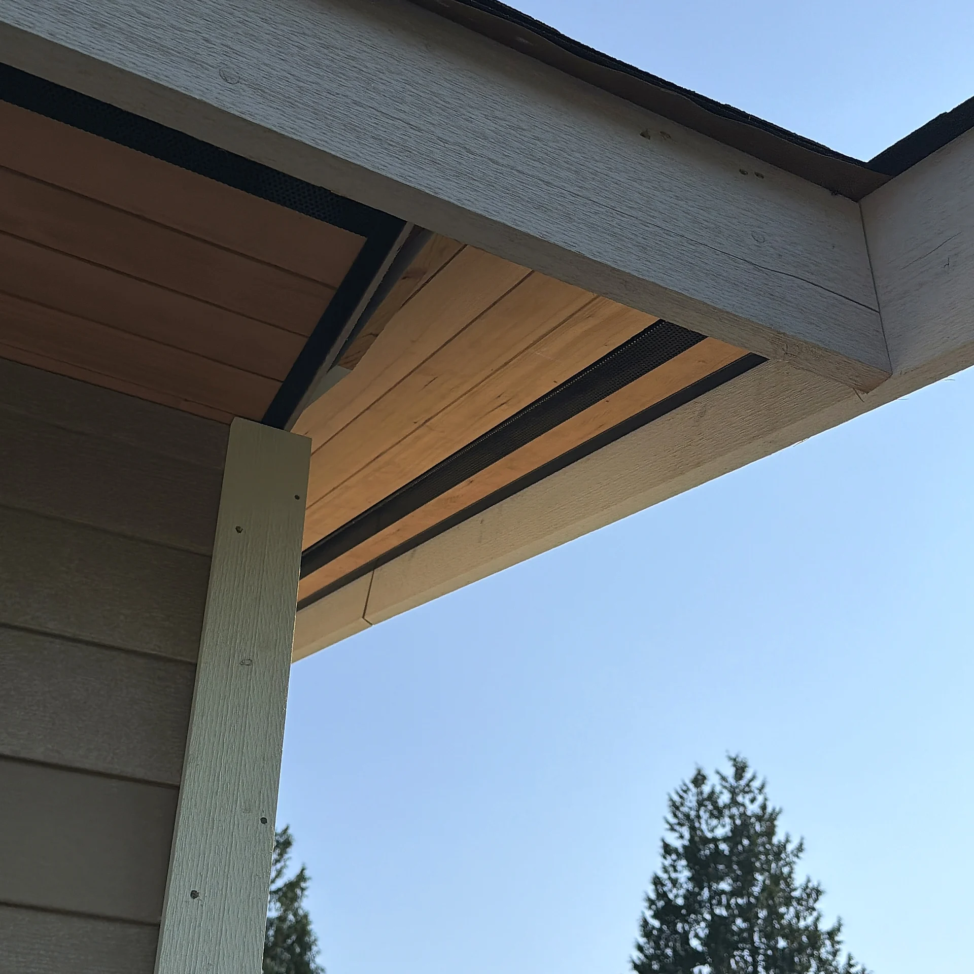 Cedar soffit turning the corner of a porch roof, North Vancouver BC