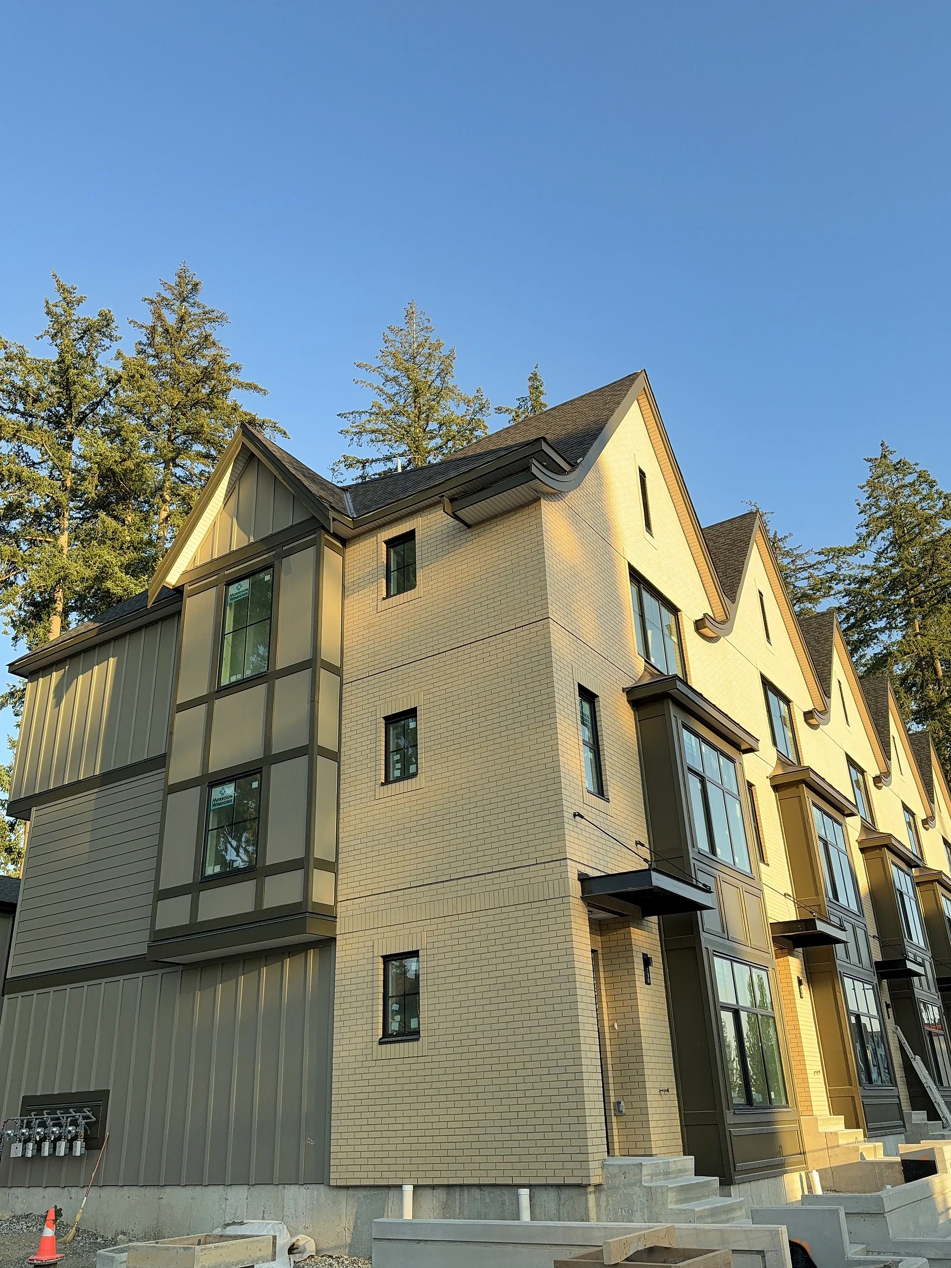 Townhouse end unit with shaped gable and panel bay, South Surrey BC