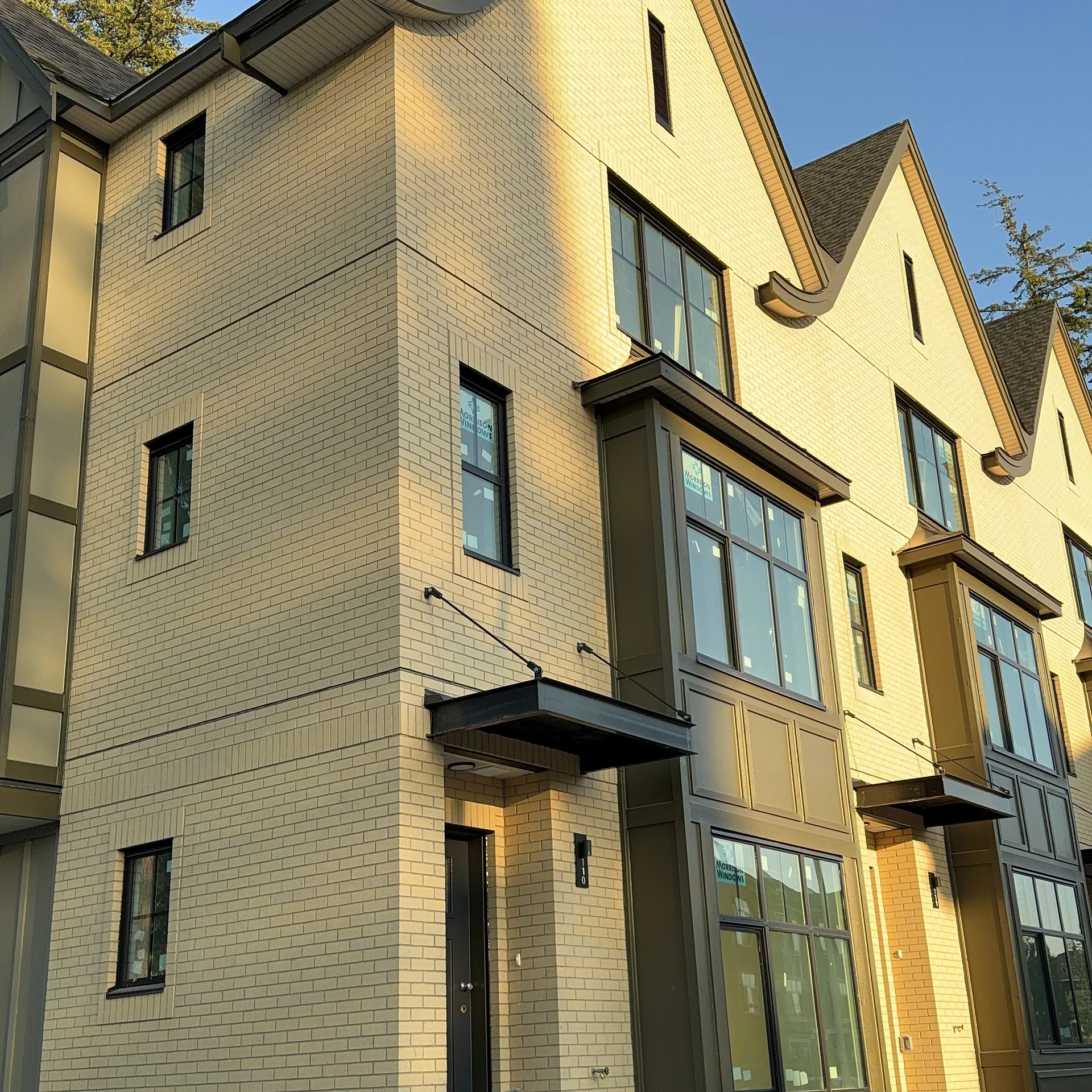 Townhouse end unit in brick and panel, South Surrey BC