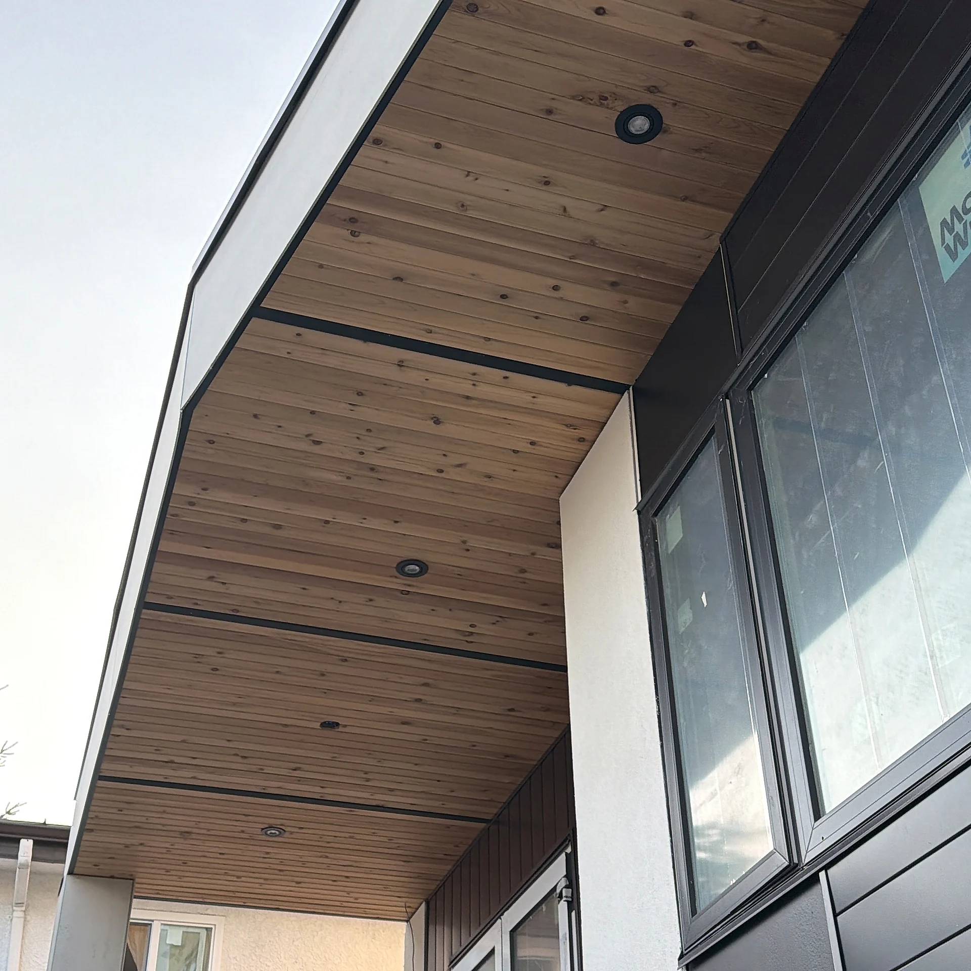 Clear cedar entry soffit sweeping over the porch, Vancouver BC