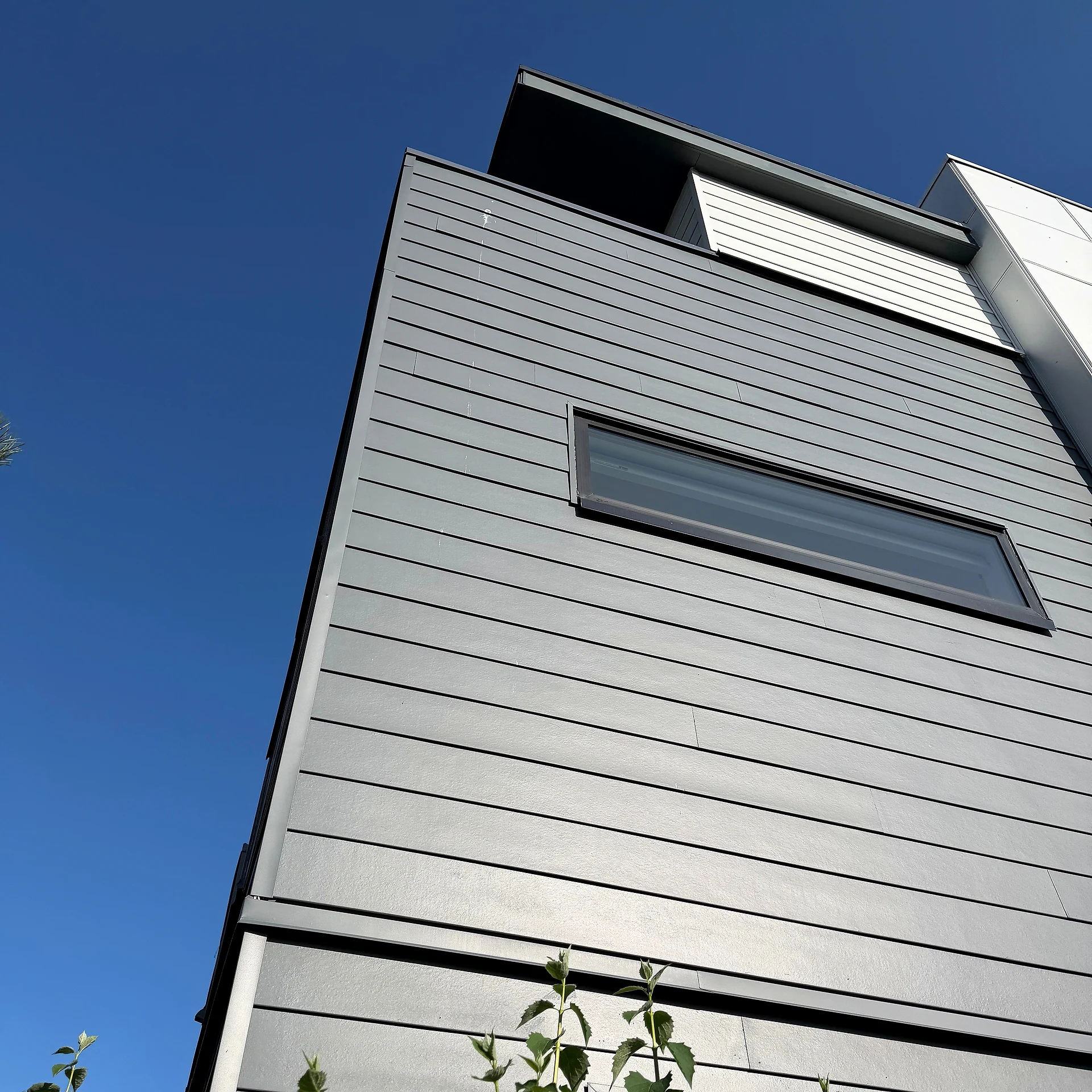 Grey lap siding texture, close-up, South Surrey BC
